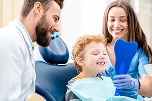 Smiling boy in dentist chair