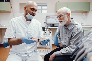 Man at the dentist’s office smiling