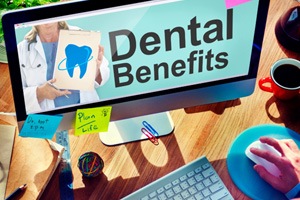 Looking up dental benefits on the computer