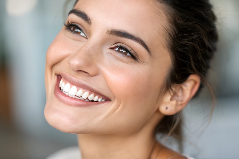 woman showing off flawless smile